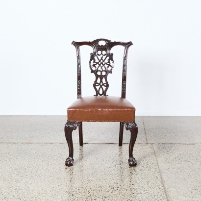 A Single Black Chippendale Style Chair