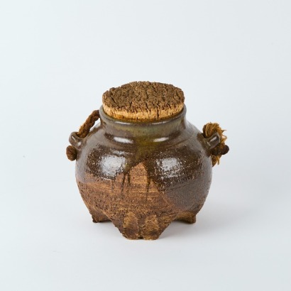 A Large Pottery Lidded Jar