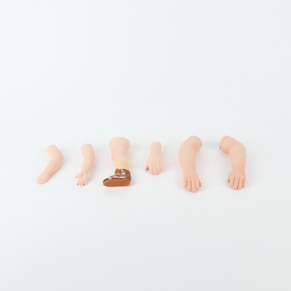 A Collection Of Porcelain Doll Limbs