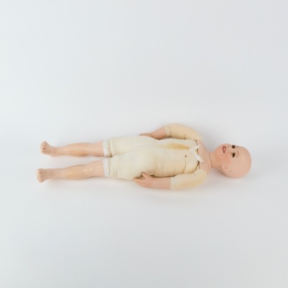 A Vintage Porcelain Doll