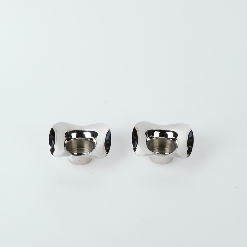 A Pair of Georg Jensen Candle Holders
