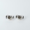 A Pair of Georg Jensen Candle Holders