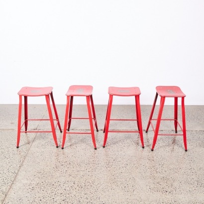 A Set of Four Industrial Metal Barstools