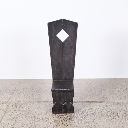 An Arts & Craft Ebonised Chair