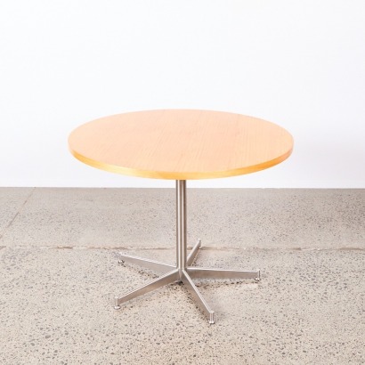 A Circular Solid Wood Table with Stainless Base