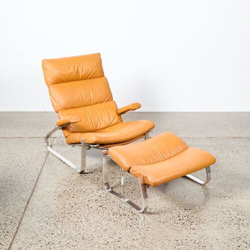 A 1970s Chrome and Leather Reclining Chair and Ottoman