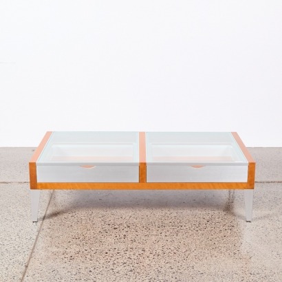 An ALBEDO Glass and Cherry Wood Veneer Coffee Table