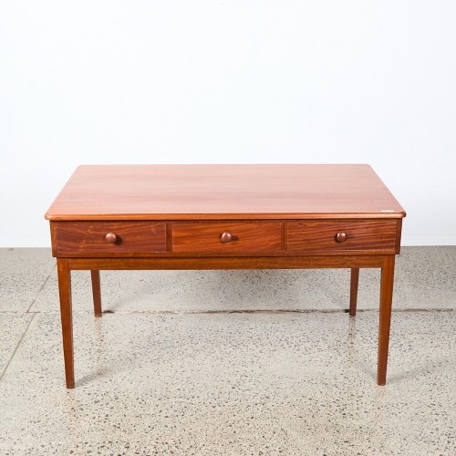 A Mid Century Solid Mahogany Desk