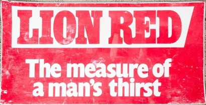 A Lion Red Tin Sign
