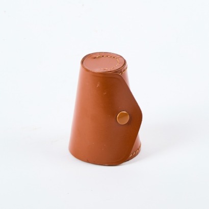 A Set of Four Retro Stacking Cups in a Leather Case