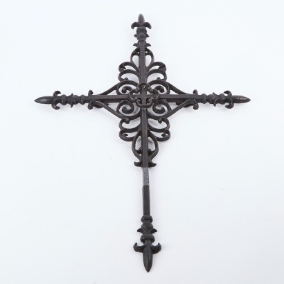 A Decorative Cast Metal Wall-Hung Cross