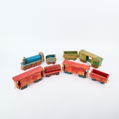 A Vintage Eight-Piece Wooden Train Set