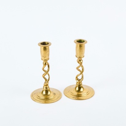 A Pair of Twisted Brass English Candlestick Holders