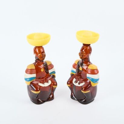 A Pair of Angostura Limbo Drummer Rum Bottles