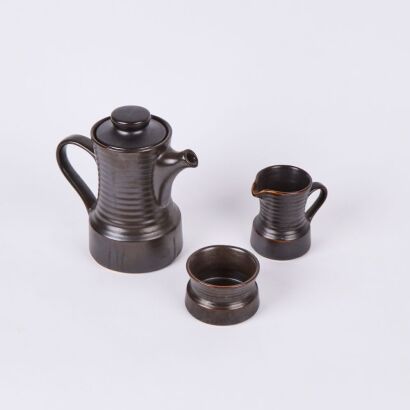 A Crown Lynn Coffee Pot, Sugar Bowl, and Creamer