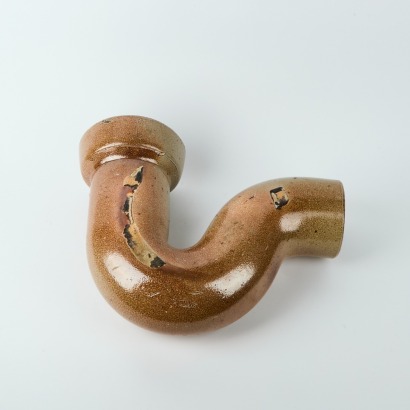 A Crum New Lynn Brickworks 'U' Bend Pipe