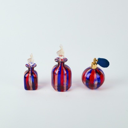 A Three Piece Art Glass Perfume Set