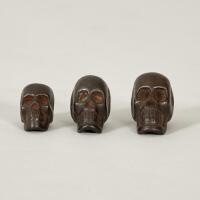 Three 19th Century Iron Skull Opium Weights