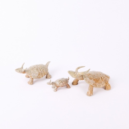 A Tineke Walst Salt Glazed Dinosaur Trio