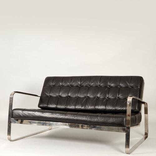 An Italian Black Leather and Chrome Lowline Sofa