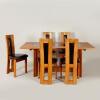 An Aiku Dining Table and Five Chairs