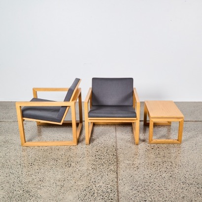 A Pair of David Moreland Framed Armchairs and Side Table