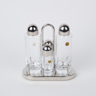 An Alessi Four Piece Condiment Set by Ettore Sottsass