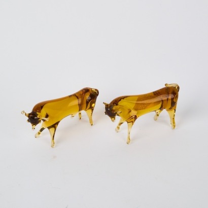 A Pair of Amber Glass Bulls A/F