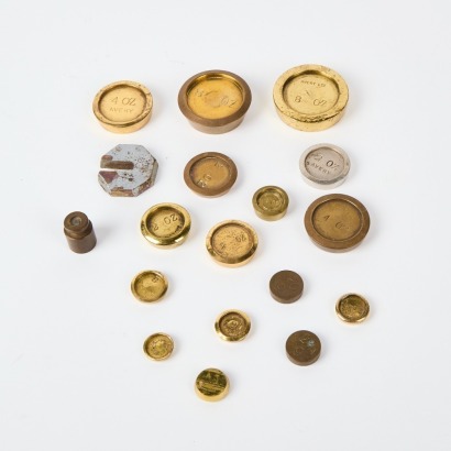 A Collection Of Brass Weights