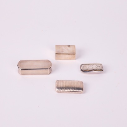 A Set Of Four Sterling Silver Containers