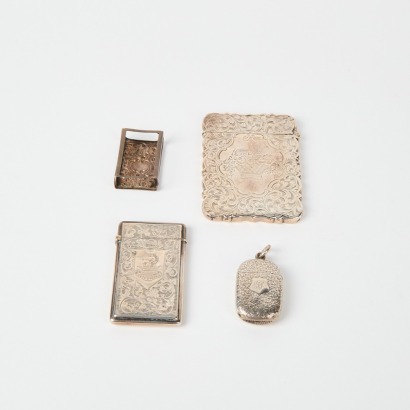 A Set Of Four Sterling Silver Matches Holders