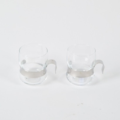 A Pair of 1970s IITTALA 'Paula' Glass Cups w/ Stainless Steel Handles, designed by Jorma Vennola (Finland)