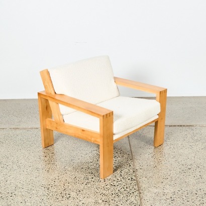 An Oak Chair Covered in Boucle Fabric