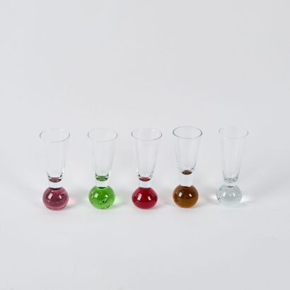 A Set Of Five Hand Blown Coloured Shot Glasses