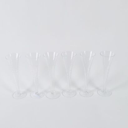 A Set Of Six Hollow Stem Champagne Flutes