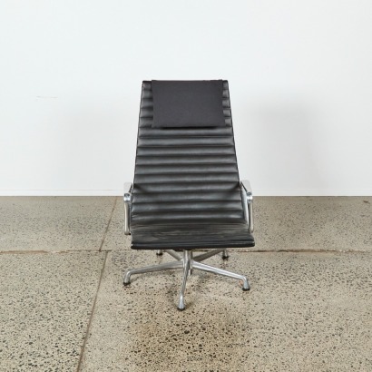 An Eames Aluminium High Back Lounge Chair by Herman Miller