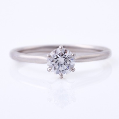 Platinum, Modern, .70ct Diamond Solitaire / .04ct Diamond Accents Ring - Near new