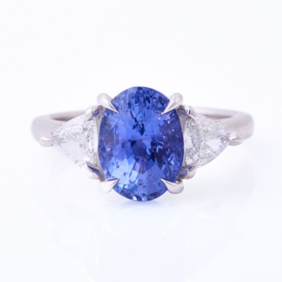 18ct White Gold, 4.11ct Blue Sapphire / .67ct Trilliant Diamond Ring - Near new