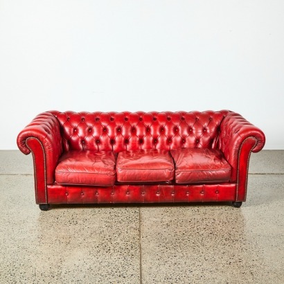 A Vintage Three Seater Chesterfield Sofa In Burgundy Leather