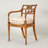 An Uncommon Regency Painted Elbow Chair