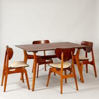 A Mid-Century Dining Table Set