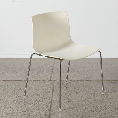 A White Plastic And Chrome Chair