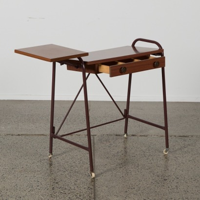 A Mid-Century Utility Cart With A Foldaway Shelf And Drawer