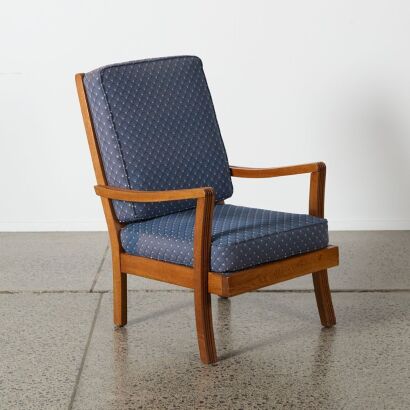 A Solid Oak Mid-Century Armchair
