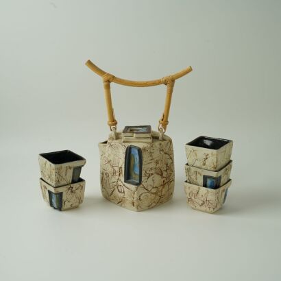 A Group of Five Chinese Pottery Teapots