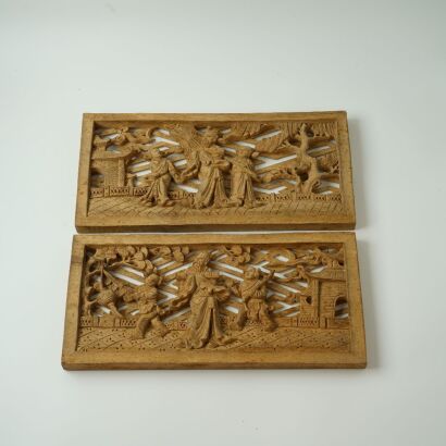 A Set of Two Chinese Qing Dynasty Carved Wooden Figural Panels