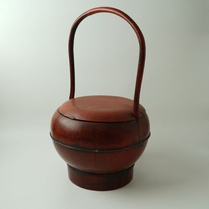A Chinese Qing Dynasty Red Lacquer Wooden Bucket