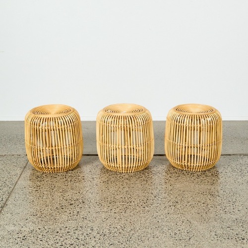 A Set of Three Rattan Stools