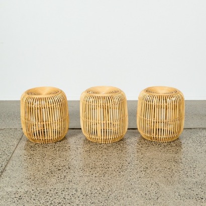 A Set of Three Rattan Stools