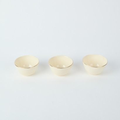 A Set of Three Crown Lynn Dawn Bowls with Gold Rims